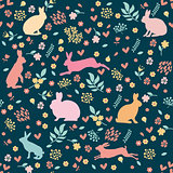 Rabbits in hearts and flowers.