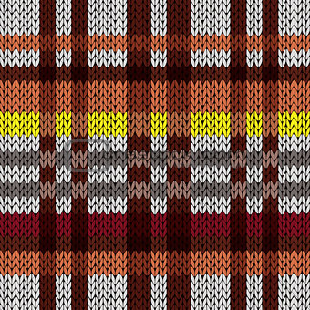 Knitting seamless pattern in brown, red, yellow, and grey hues