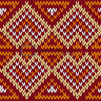 Ethnic knitting seamless pattern in warm hues