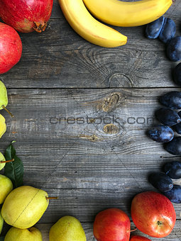 Fruits background old wooden frame lined