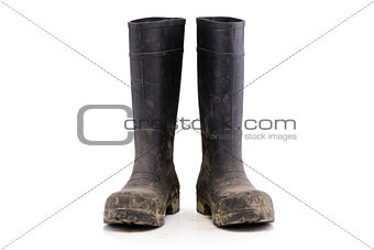Dry dirty Mud boots isolated on white front view
