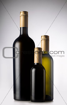 Different wine bottles with pilfers