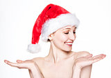 Beautiful woman happy christmas in santa hat tree