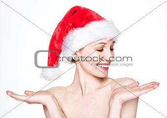 Beautiful woman happy christmas in santa hat tree