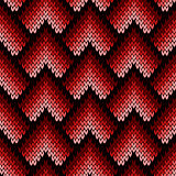 Abstract ornate knitting seamless pattern in red hues