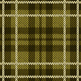 Knitting checkered seamless pattern mainly in warm green hues