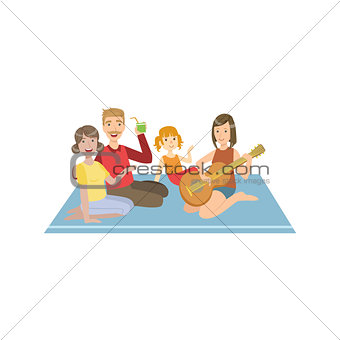 Family On Picnic WIth Guitar