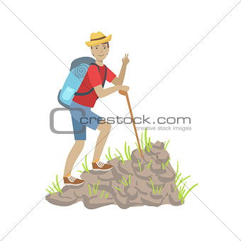 Man Climbing A Rocky Slope With Backpack