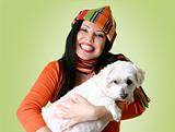 Woman holding a dog in her arms