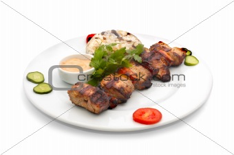 shish kebab with rice and mushrooms