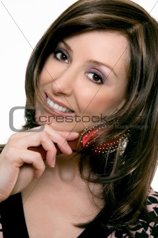 Haircare - Female using a hairbrush