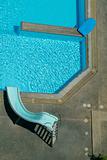 Swimming-pool with slide