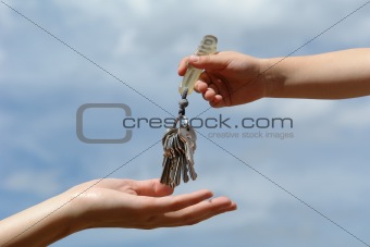 child's hand with keys