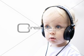 Young boy wearing headphones