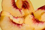 Slices of peach isolated, focus on center
