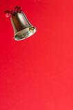 Ringing bell on red background