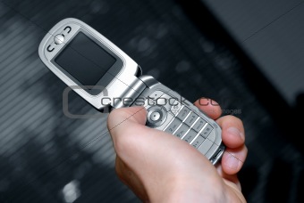 Hand and cell phone