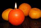  mandarins, orange and candle