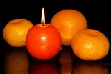  mandarins, orange and candle
