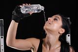 Beautifull fitness girl drinking water