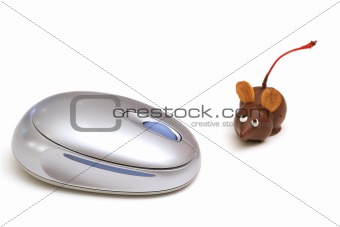 shot of a single chocolate mouse beside mouse