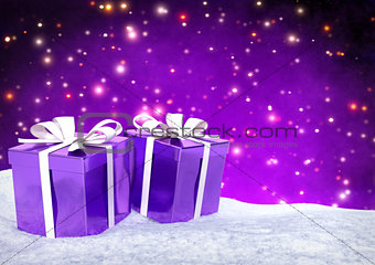 Christmas gifts in snow on bokeh purple background. 3D render.
