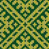 Knitting ornate seamless pattern in green and yellow colors