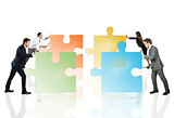 Concept of teamwork and partnership with businesspeople and puzzle.