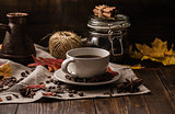 Cup of coffee at autumn evening