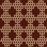 Knitting seamless ornate pattern in brown and cocoa colors