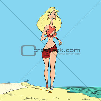 Athletic woman runs along the beach