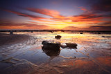 Sunrise reflections across Long Reef Australia