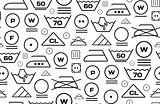 Pattern created from laundry washing symbols on a white background