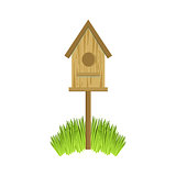 Wooden Bird House On Grass
