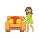 Girl Cleaning Dust Off Armchair WIth Brush