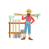 Bearded Man With Stack Of Farming Equipment