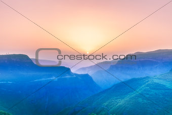 landscape with mountains and sky in sunset