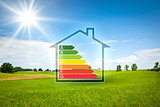 green house in the sun with energy efficiency graph
