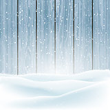 Winter snow on wood background 