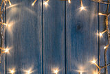 Christmas lights on wooden table