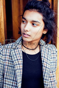 young pretty student teenage indian girl in doors happy smiling, having fun, lifestyle people concept