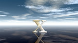 metal uppercase letter x under cloudy sky - 3d rendering