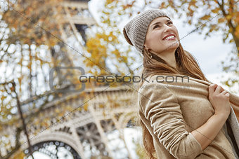 happy tourist woman in Paris, France looking into distance