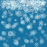 Christmas holiday background with snowflakes. Winter pattern