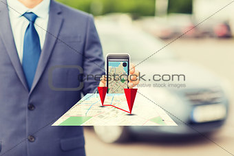 close up of business man with smartphone navigator