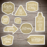 Stickers on rustic wood background