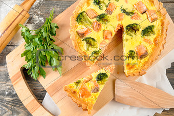 delicious pie with salmon and broccoli