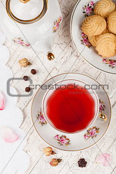 cup of red tea on serving table