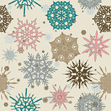 Seamless texture with snowflakes.