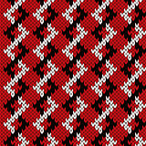 Knitting zigzag seamless pattern in red and white colors